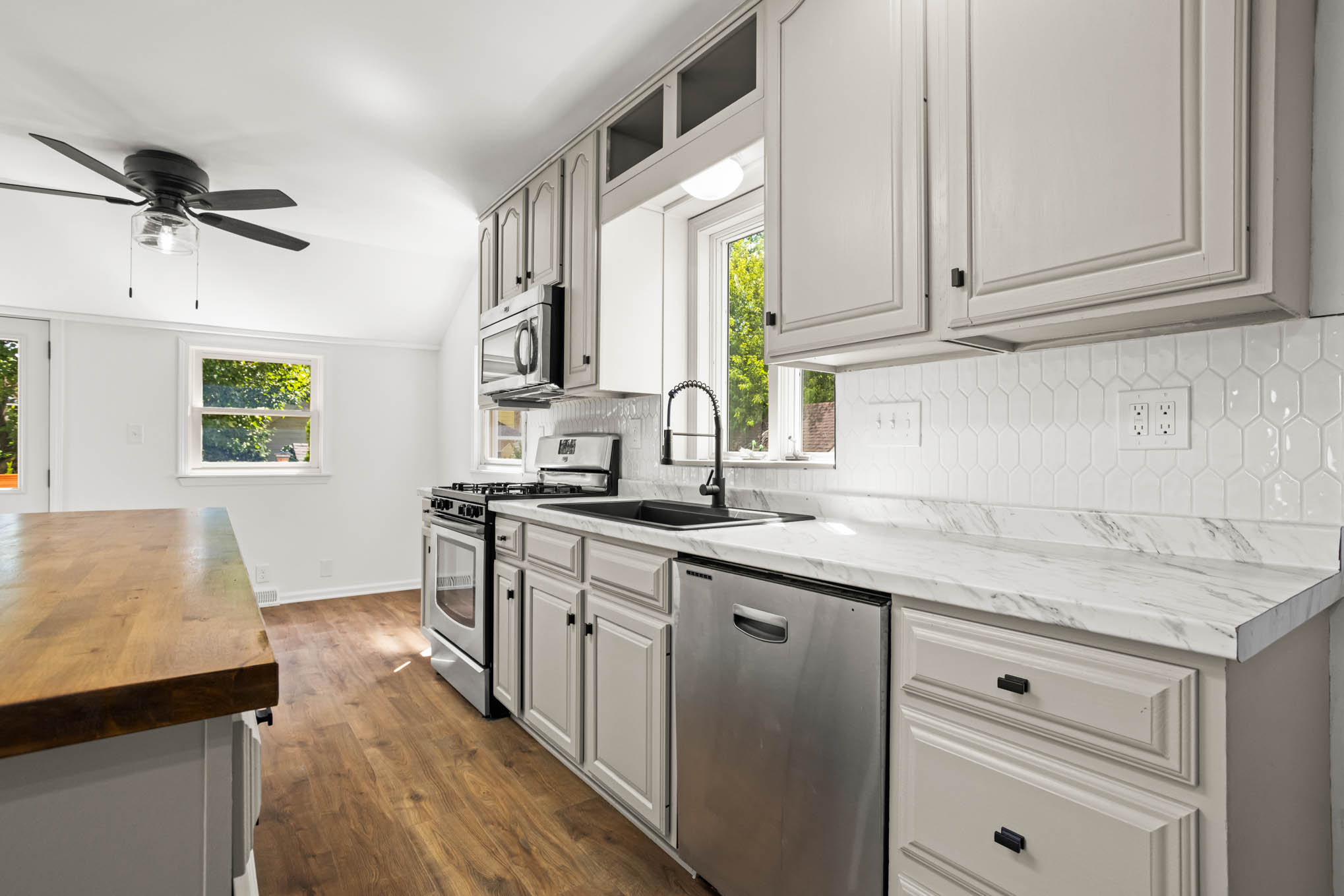 Kitchen cabinetry and stainless-steel appliances