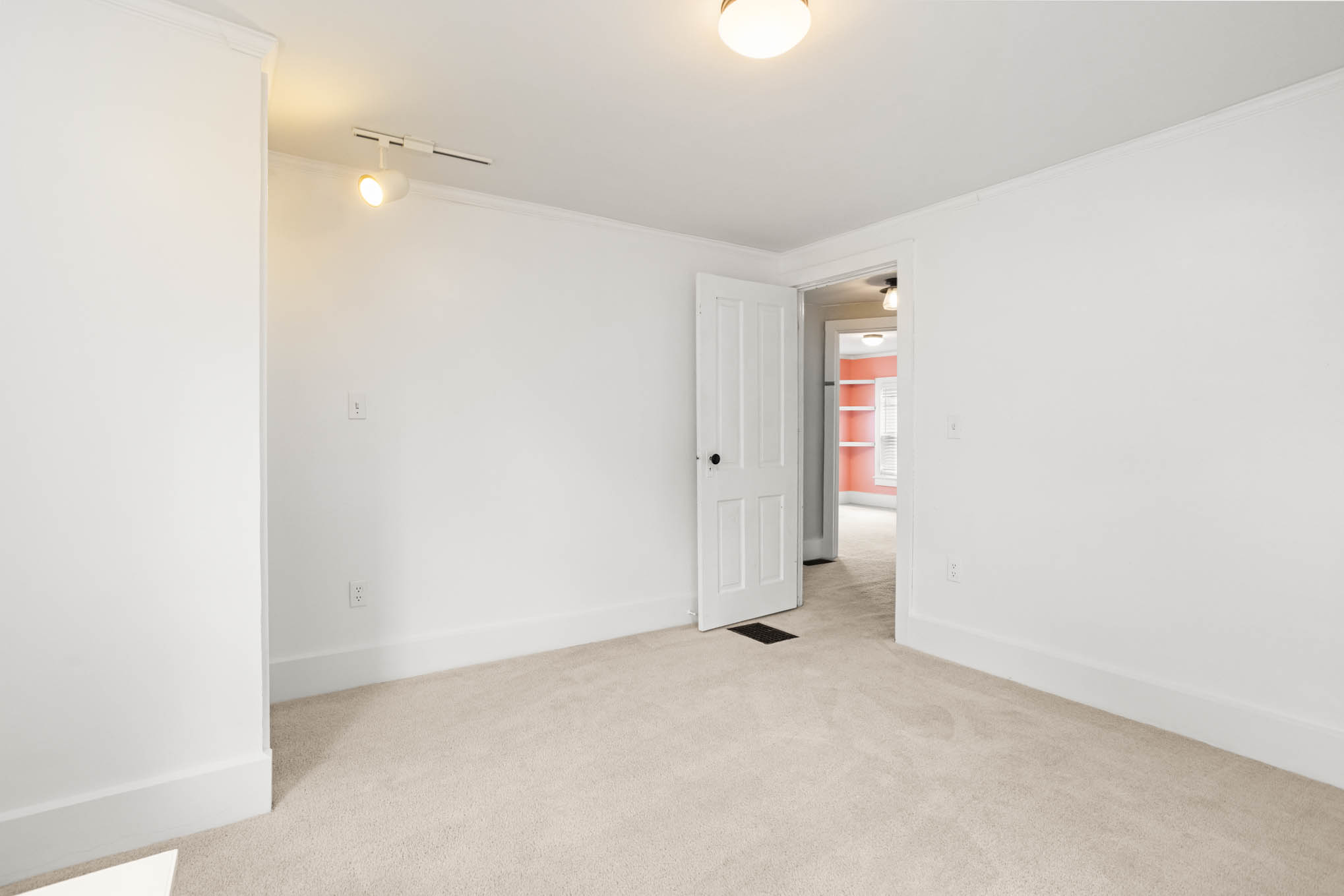 Carpeted bedroom at 52 North Lyon Street